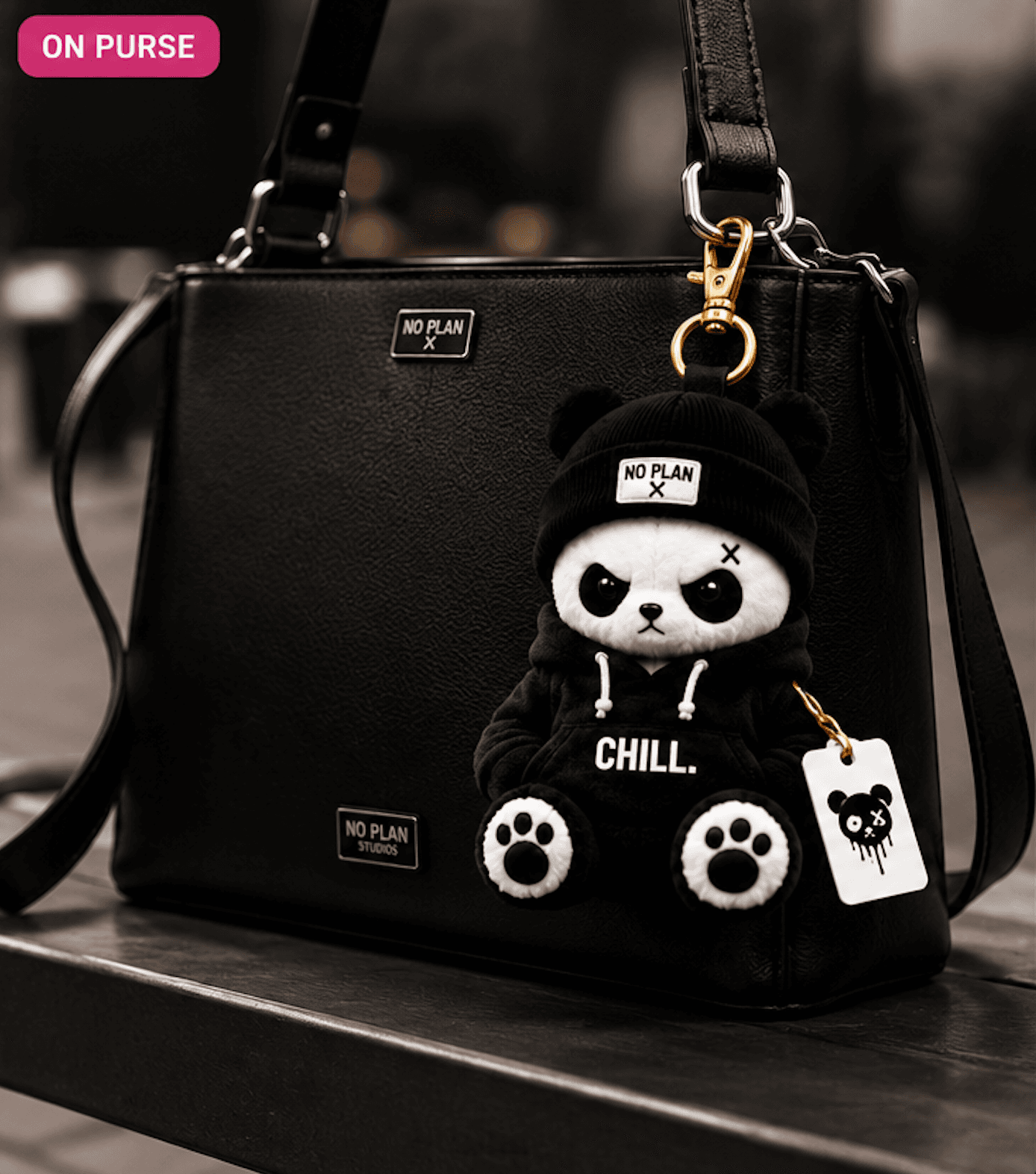 No Plan Panda on a purse